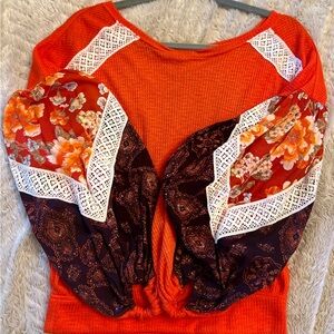 Free people long sleeved shirt.